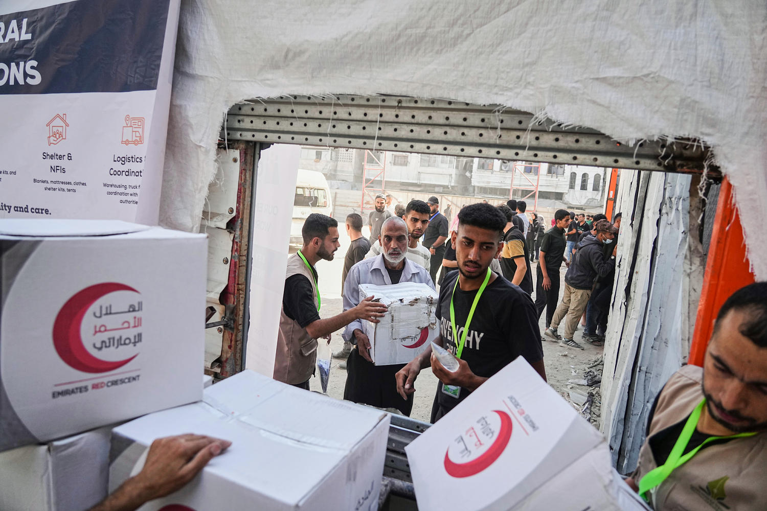 Israel halts aid, official says, as Palestinian clans in Gaza deny Hamas is stealing it​Reuters